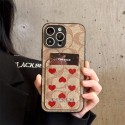 Coach 風モノグラムハートデザインカードポケット付き iPhone17 16 11 スマホケース 可愛らしさと高級感を融合したファッションアイテム